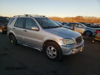 2002 Mercedes-Benz M-Class with VIN 4JGAB54E32A312131, listed as a Copart auction lot 80490084 with 165,365 mi miles and Salvage Title. Bid and sale history available at carsss.com. Image 4.