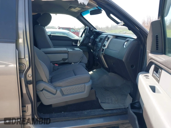 2013 Ford F-150 XL with VIN 1FTFW1ET3DFA00787, listed as a IAAI auction lot 42079893 with 143,874 mi miles. Bid and sale history available at carsss.com. Image 5.
