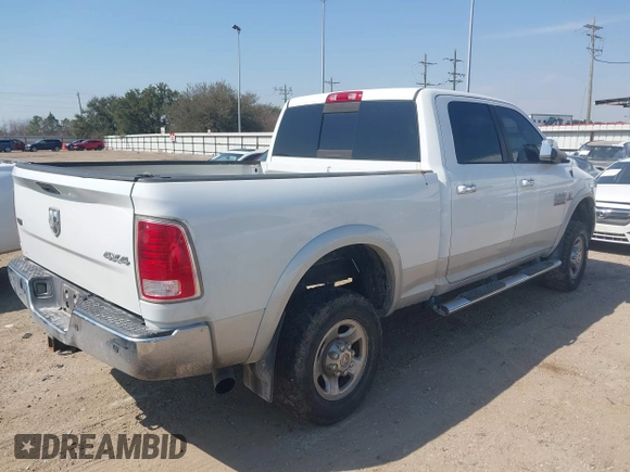 2015 Ram 2500 Laramie with VIN 3C6UR5FL8FG524398, listed as a IAAI auction lot 41699409 with 259,972 mi miles. Bid and sale history available at carsss.com. Image 4.