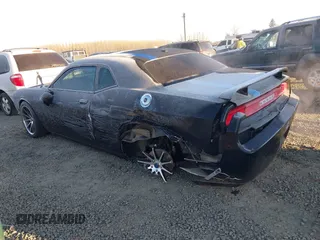 2013 Dodge Challenger R/T z VIN 2C3CDYBT1DH501055, wystawiony jako IAAI lot #41424579 z przebiegiem 156 492 mil mil oraz . Historia ofert i sprzedaży dostępna na DreamBid. Obrazek 3.