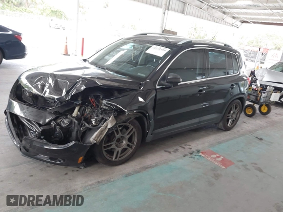 2011 Volkswagen Tiguan SE with VIN WVGAV7AX1BW549681, listed as a IAAI auction lot 40772939 with 157,547 mi miles and . Bid and sale history available at DreamBid. Image 17.