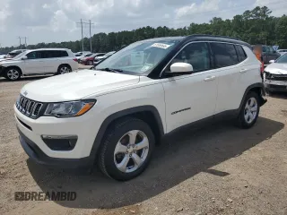 2018 Jeep Compass Latitude with VIN 3C4NJCBB3JT145069, listed as a Copart auction lot 61859665 with 68,476 mi miles and Salvage title. Bid and sale history available at DreamBid. Image 1.