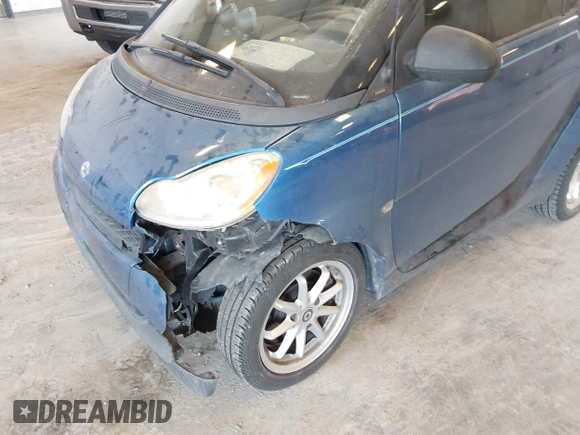 2009 Smart fortwo Pure with VIN WMEEJ31X89K228315, listed as a IAAI auction lot 42662931 with 60,666 mi miles and . Bid and sale history available at DreamBid. Image 6.