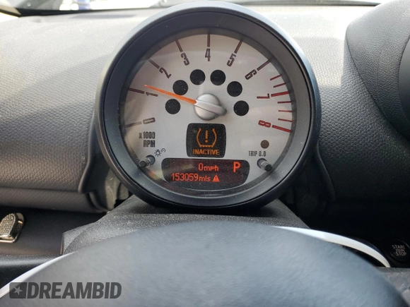 2014 MINI Countryman S with VIN WMWZC3C57EWP25099, listed as a Copart auction lot 62646555 with 153,059 mi miles and Salvage title. Bid and sale history available at DreamBid. Image 9.