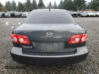 2004 Mazda 6 i with VIN 1YVFP80C045N12892, listed as a Copart auction lot 86513924 with 230,683 mi miles and Salvage Title. Bid and sale history available at DreamBid. Image 6.