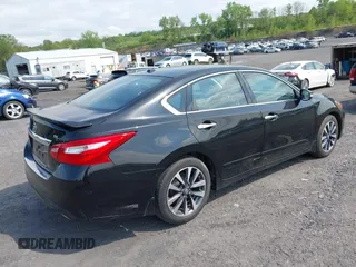 2016 Nissan Altima SV with VIN 1N4AL3AP1GC272239, listed as a IAAI auction lot 42234775 with 67,548 mi miles and . Bid and sale history available at DreamBid. Image 4.