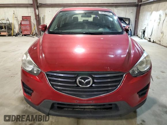 2016 Mazda CX-5 Sport z VIN JM3KE4BY9G0824021, wystawiony jako Copart lot #52392345 z przebiegiem 121 990 mil mil oraz Szkoda całkowita • Salvage title. Historia ofert i sprzedaży dostępna na DreamBid. Obrazek 5.