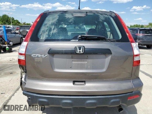 2009 Honda CR-V LX z VIN 5J6RE48399L025855, wystawiony jako Copart lot #60359355 z przebiegiem 262 261 mil mil oraz Czysty tytuł • Clean title. Historia ofert i sprzedaży dostępna na DreamBid. Obrazek 6.