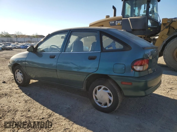 1996 Ford Aspire z VIN KNJLT06H0T6195551, wystawiony jako Copart lot #79450694 z przebiegiem 887 992 mil mil oraz Czysty tytuł • Clean title. Historia ofert i sprzedaży dostępna na DreamBid. Obrazek 2.
