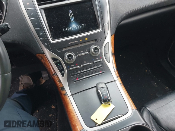 2016 Lincoln MKX Select with VIN 2LMTJ6KR5GBL30010, listed as a IAAI auction lot 41741385 with 112,647 mi miles. Bid and sale history available at carsss.com. Image 11.
