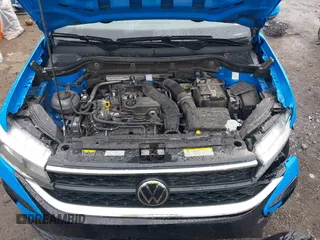 2023 Volkswagen Taos SE z VIN 3VVNX7B28PM305652, wystawiony jako IAAI lot #41892522 z przebiegiem 50 644 mil mil oraz . Historia ofert i sprzedaży dostępna na DreamBid. Obrazek 10.