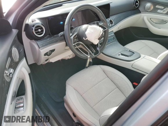 2022 Mercedes-Benz E-Class E 350 with VIN W1KZF8DB8NB075739, listed as a Copart auction lot 84028124 with 23,405 mi miles and Salvage Title. Bid and sale history available at carsss.com. Image 8.