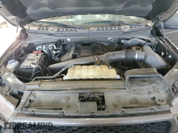 2020 Ford F-150 XL with VIN 1FTEW1E44LFC02735, listed as a Copart auction lot 62062125 with 111,471 mi miles and Salvage title. Bid and sale history available at DreamBid. Image 11.