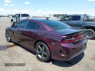 2021 Dodge Charger R/T with VIN 2C3CDXCT2MH574377, listed as a IAAI auction lot 42760667 with 49,295 mi miles and . Bid and sale history available at DreamBid. Image 3.