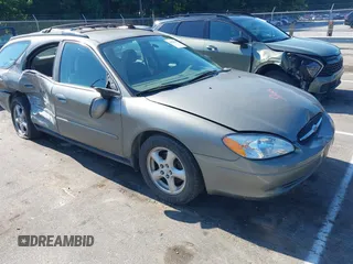 2003 Ford Taurus SE Standard z VIN 1FAFP58U23A247664, wystawiony jako IAAI lot #42658598 z przebiegiem 99 697 mil mil oraz . Historia ofert i sprzedaży dostępna na DreamBid. Obrazek 1.