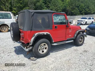 2001 Jeep Wrangler Sport with VIN 1J4FA49S51P365327, listed as a Copart auction lot 61720115 with 194,086 mi miles and Salvage title. Bid and sale history available at DreamBid. Image 3.