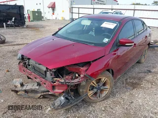 2016 Ford Focus SE with VIN 1FADP3FE6GL208688, listed as a IAAI auction lot 40980789 with 105,954 mi miles. Bid and sale history available at carsss.com. Image 2.