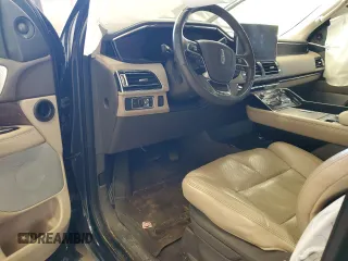 2022 Lincoln Navigator Reserve z VIN 5LMJJ2LT8NEL04053, wystawiony jako Copart lot #57211255 z przebiegiem Nie podano mil oraz Szkoda całkowita • Salvage title. Historia ofert i sprzedaży dostępna na DreamBid. Obrazek 8.