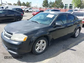 2012 Dodge Avenger SXT with VIN 1C3CDZCB9CN177919, listed as a IAAI auction lot 41944935 with 169,071 mi miles and . Bid and sale history available at carsss.com. Image 2.