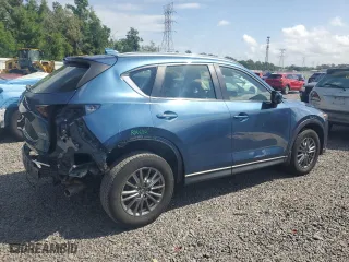 2018 Mazda CX-5 Sport with VIN JM3KFABM2J1406068, listed as a Copart auction lot 52354125 with 127,338 mi miles and Salvage Title. Bid and sale history available at carsss.com. Image 3.