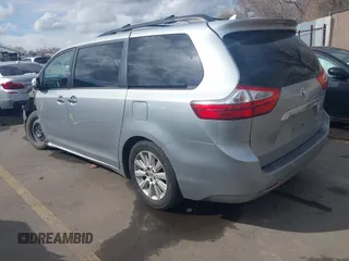 2015 Toyota Sienna XLE with VIN 5TDYK3DC2FS640204, listed as a IAAI auction lot 41772349 with 104,156 mi miles. Bid and sale history available at carsss.com. Image 3.