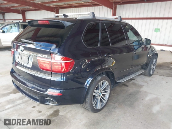 2013 BMW X5 xDrive50i with VIN 5UXZV8C58D0C16278, listed as a IAAI auction lot 41777496 with 138,547 mi miles and . Bid and sale history available at DreamBid. Image 4.