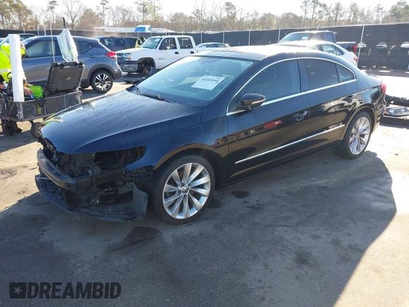 2013 Volkswagen CC VR6 Lux with VIN WVWHU7AN8DE509059, listed as a IAAI auction lot 41402695 with 123,518 mi miles. Bid and sale history available at carsss.com. Image 2.