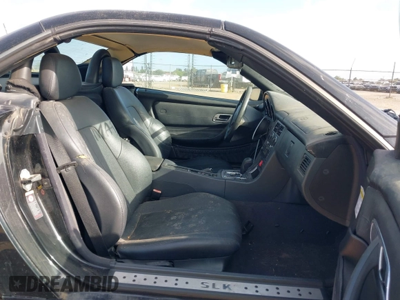 2003 Mercedes-Benz SLK-Class 2.3L with VIN WDBKK49F33F273872, listed as a IAAI auction lot 42111682 with 143,969 mi miles. Bid and sale history available at carsss.com. Image 8.