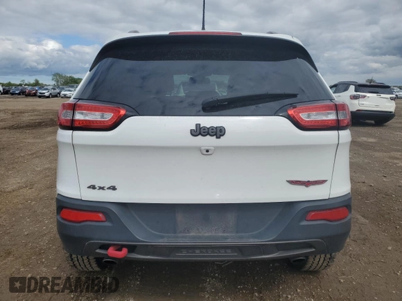 2016 Jeep Cherokee Trailhawk with VIN 1C4PJMBS8GW359461, listed as a Copart auction lot 57950705 with 146,124 mi miles and Salvage title. Bid and sale history available at DreamBid. Image 6.