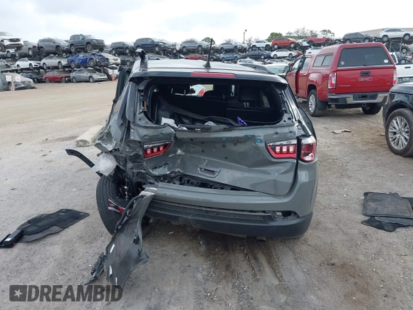 2023 Jeep Compass Latitude with VIN 3C4NJDBN8PT548652, listed as a IAAI auction lot 41572378 with 48,192 mi miles and . Bid and sale history available at carsss.com. Image 16.