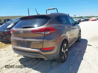 2016 Hyundai Tucson Sport with VIN KM8J33A29GU054909, listed as a IAAI auction lot 41835688 with 90,751 mi miles. Bid and sale history available at carsss.com. Image 4.