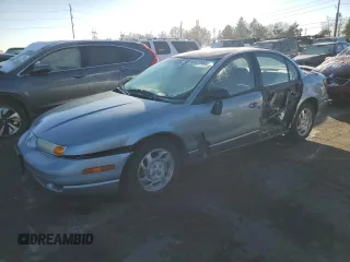 2001 Saturn SL with VIN 1G8ZJ52731Z329956, listed as a Copart auction lot 80221654 with 217,358 mi miles and Salvage Title. Bid and sale history available at DreamBid. Image 1.