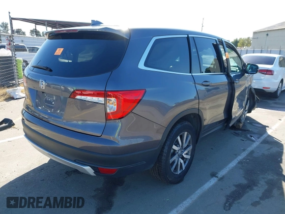 2020 Honda Pilot EX-L with VIN 5FNYF5H51LB020830, listed as a IAAI auction lot 42255746 with 60,503 mi miles and . Bid and sale history available at DreamBid. Image 4.