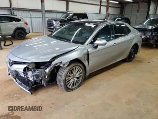 2018 Toyota Camry LE with VIN 4T1B11HK2JU029457, listed as a Copart auction lot 49973115 with 131,198 mi miles and Salvage title. Bid and sale history available at DreamBid. Image 1.