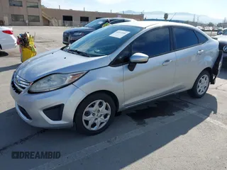 2012 Ford Fiesta SE with VIN 3FADP4BJ2CM150953, listed as a IAAI auction lot 42010904 with 77,637 mi miles. Bid and sale history available at carsss.com. Image 17.