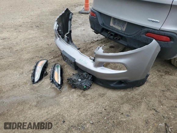 2014 Jeep Cherokee Latitude with VIN 1C4PJLCS5EW169008, listed as a Copart auction lot 51999135 with 180,153 mi miles and Salvage Title. Bid and sale history available at DreamBid. Image 12.