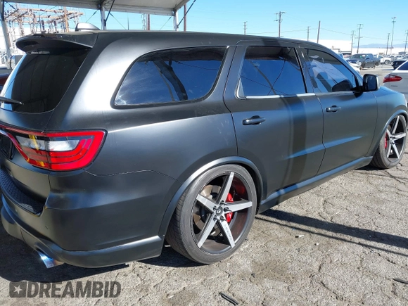 2021 Dodge Durango SRT Hellcat z VIN 1C4SDJH99MC818692, wystawiony jako IAAI lot #41070204 z przebiegiem 12 105 mil mil oraz . Historia ofert i sprzedaży dostępna na DreamBid. Obrazek 4.