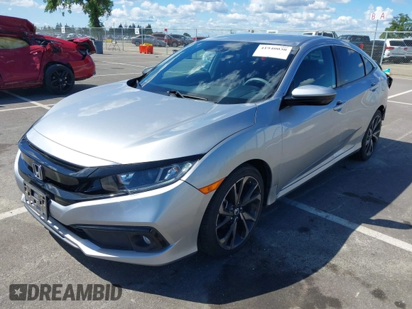 2019 Honda Civic Sedan Sport with VIN 2HGFC2F82KH519464, listed as a IAAI auction lot 41940030 with 59,718 mi miles. Bid and sale history available at carsss.com. Image 18.