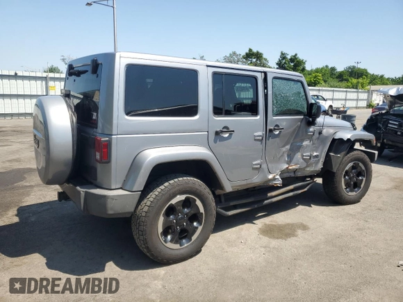 2014 Jeep Wrangler Unlimited Sahara with VIN 1C4BJWEG8EL236951, listed as a Copart auction lot 61046575 with 146,642 mi miles and Salvage title. Bid and sale history available at DreamBid. Image 3.