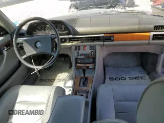 1984 Mercedes-Benz 500 z VIN WDBCA44A6EA018569, wystawiony jako Copart lot #54617005 z przebiegiem 96 009 mil mil oraz Czysty tytuł • Clean title. Historia ofert i sprzedaży dostępna na DreamBid. Obrazek 8.