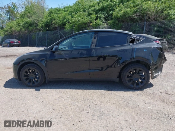 2023 Tesla Model Y Long Range with VIN 7SAYGDEE0PA111430, listed as a IAAI auction lot 42156924 with 35,950 mi miles and . Bid and sale history available at DreamBid. Image 15.