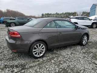 2015 Volkswagen Eos Komfort with VIN WVWBW8AH3FV000399, listed as a Copart auction lot 81398264 with 82,533 mi miles and Salvage Title. Bid and sale history available at DreamBid. Image 3.