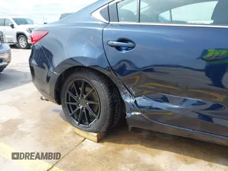 2015 Mazda 6 i Sport with VIN JM1GJ1U52F1201571, listed as a IAAI auction lot 42096344 with 88,290 mi miles and . Bid and sale history available at DreamBid. Image 6.