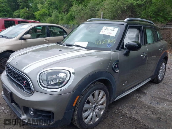 2020 MINI Countryman Cooper S with VIN WMZYX1C06L3L47965, listed as a IAAI auction lot 42277163 with 18,807 mi miles and . Bid and sale history available at DreamBid. Image 2.