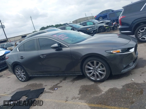 2021 Mazda 3 Preferred with VIN 3MZBPACL6MM252531, listed as a IAAI auction lot 42145811 with 35,869 mi miles and . Bid and sale history available at DreamBid. Image 12.