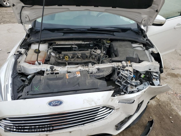 2016 Ford Focus Titanium z VIN 1FADP3N23GL345904, wystawiony jako Copart lot #60139525 z przebiegiem 97 572 mil mil oraz Szkoda całkowita • Salvage title. Historia ofert i sprzedaży dostępna na DreamBid. Obrazek 11.