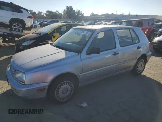 1998 Volkswagen Golf z VIN 3VWFA81H8WM251233, wystawiony jako Copart lot #42441795 z przebiegiem 122 969 mil mil oraz Czysty tytuł • Clean title. Historia ofert i sprzedaży dostępna na DreamBid. Obrazek 1.