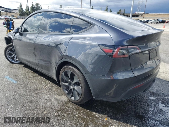 2024 Tesla Model Y z VIN 7SAYGDED1RF089192, wystawiony jako Copart lot #48752085 z przebiegiem 7 643 mil mil oraz Szkoda całkowita • Salvage title. Historia ofert i sprzedaży dostępna na DreamBid. Obrazek 2.