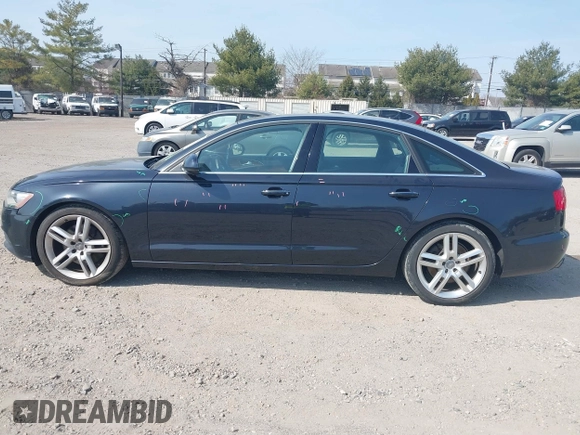 2015 Audi A6 Premium Plus z VIN WAUGFAFC8FN044809, wystawiony jako IAAI lot #41810102 z przebiegiem 153 577 mil mil oraz . Historia ofert i sprzedaży dostępna na DreamBid. Obrazek 14.