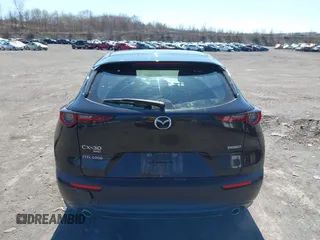 2021 Mazda CX-30 S with VIN 3MVDMBAL3MM214735, listed as a IAAI auction lot 42000096 with 46,794 mi miles and . Bid and sale history available at DreamBid. Image 16.